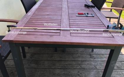 Abb.12: Versuchsaufbau zur Prüfung der Reißfestigkeit von Fäden